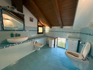 Ένα μπάνιο στο L’attico del capitano: loft con terazza sul mare +36 φωτογραφίες