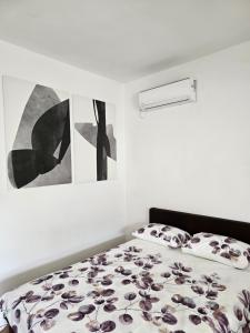 Postel nebo postele na pokoji v ubytování Apartmani Radman 1 - Igalo