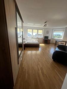 Posteľ alebo postele v izbe v ubytovaní Apartamenty Centrum