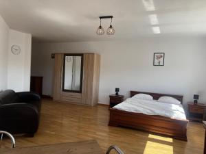 Posteľ alebo postele v izbe v ubytovaní Apartamenty Centrum