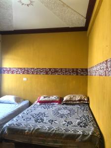 Postel nebo postele na pokoji v ubytování Hotel Henderson