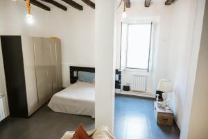 Postel nebo postele na pokoji v ubytování Casetta di Lu'