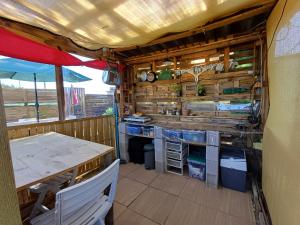 an interior view of a kitchen in a rv at TENTES sur une aire privée en pleine nature in Massillargues-Attuech