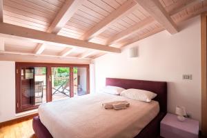 Ένα ή περισσότερα κρεβάτια σε δωμάτιο στο Villa a Scafa con Vista Mozzafiato +84 φωτογραφίες