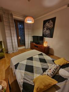 Łóżko lub łóżka w pokoju w obiekcie City Center Studio Apartments