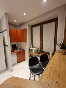 Kuchnia lub aneks kuchenny w obiekcie City Center Studio Apartments