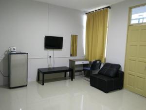 TV a/nebo společenská místnost v ubytování JS&K Homestay