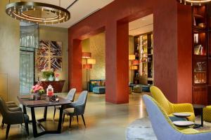 a dining room with a table and chairs at Enterprise Hotel Design & Boutique in Milan