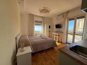 Postel nebo postele na pokoji v ubytování MiraValle Agrigento 2