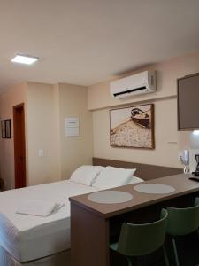 Postel nebo postele na pokoji v ubytování VILA ATLÂNTIDA 211A + 41 fotografií