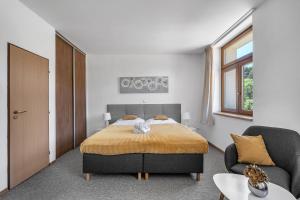 Ένα ή περισσότερα κρεβάτια σε δωμάτιο στο Hotel PODKOST