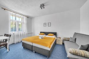 Ένα ή περισσότερα κρεβάτια σε δωμάτιο στο Hotel PODKOST