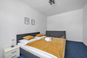 Ένα ή περισσότερα κρεβάτια σε δωμάτιο στο Hotel PODKOST