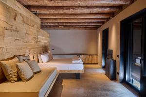Postel nebo postele na pokoji v ubytování Appartament, Resort Corte Renèè, lago di Garda