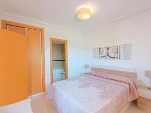 Posteľ alebo postele v izbe v ubytovaní Ayf 3 habitaciones en 1ª linea de playa