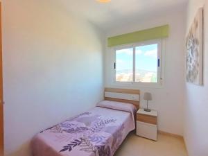 Posteľ alebo postele v izbe v ubytovaní Ayf 3 habitaciones en 1ª linea de playa
