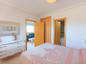 Posteľ alebo postele v izbe v ubytovaní Ayf 3 habitaciones en 1ª linea de playa