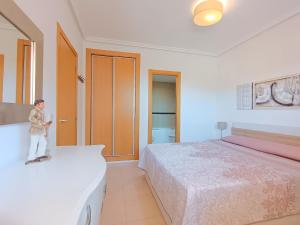 Posteľ alebo postele v izbe v ubytovaní Ayf 3 habitaciones en 1ª linea de playa