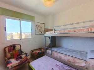 Posteľ alebo postele v izbe v ubytovaní Ayf 3 habitaciones en 1ª linea de playa