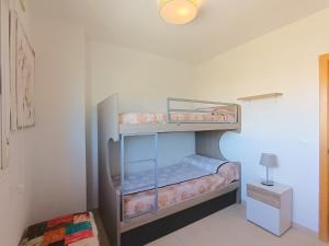 Posteľ alebo postele v izbe v ubytovaní Ayf 3 habitaciones en 1ª linea de playa