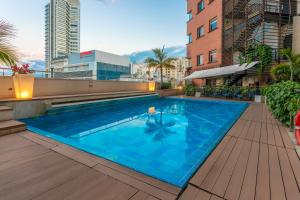 Bazén v ubytování Hotel Spiwak Chipichape Cali nebo v jeho okolí