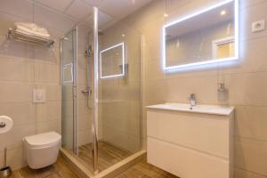 Kúpeľňa v ubytovaní Pellegrini Luxury Rooms