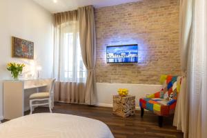 Posteľ alebo postele v izbe v ubytovaní Pellegrini Luxury Rooms