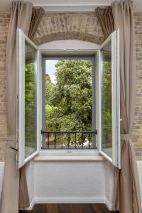 Balkón alebo terasa v ubytovaní Pellegrini Luxury Rooms