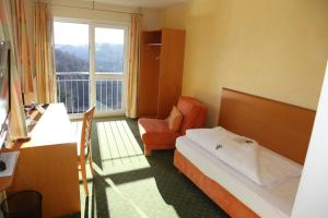 Postel nebo postele na pokoji v ubytování Berggasthof Hotel Igelwirt