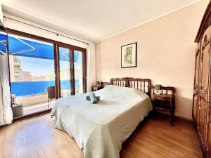 Кровать или кровати в номере Le Sulky, proche de la mer, balcon, parking