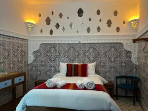 Katil atau katil-katil dalam bilik di Riad Imndi