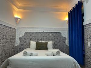 Katil atau katil-katil dalam bilik di Riad Imndi