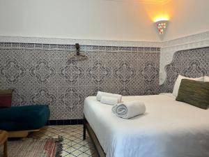 Katil atau katil-katil dalam bilik di Riad Imndi