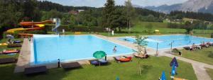 Bazén v ubytování Gasthof Hotel Schermer nebo v jeho okolí