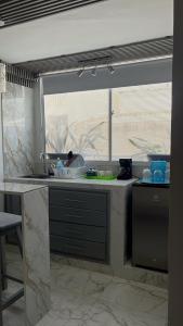 Kuchyň nebo kuchyňský kout v ubytování Apartamento Centro Histórico Cartagena
