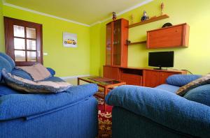 Televisyen dan/atau pusat hiburan di Apartamento con parking en Vilanova de Arousa