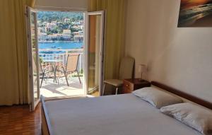 Postel nebo postele na pokoji v ubytování Bleus Apartments