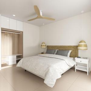 a bedroom with a bed and a ceiling fan at Valencia Living Suites in Picanya
