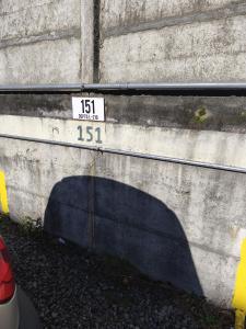 a street sign on the side of a wall at Departamento Corcovado in Puerto Montt +4 photos