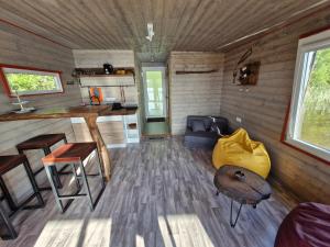 a living room of a tiny house at Ezermāja in Saldus