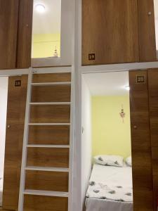 Postel nebo postele na pokoji v ubytování Hotel Kapsul Vlore