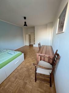Postel nebo postele na pokoji v ubytování KamperwegHaus near Düsseldorf + 18 fotografií