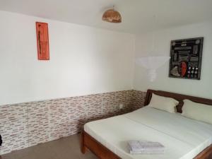 Casa Cacheu Homestay Guest House客房内的一张或多张床位