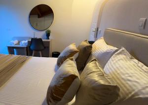 Ένα ή περισσότερα κρεβάτια σε δωμάτιο στο Sami Loft