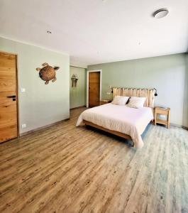 Voodi või voodid majutusasutuse Alice Cottage toas