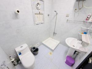 Kúpeľňa v ubytovaní Muscat Dormitory Male&Female