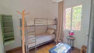 Postel nebo postele na pokoji v ubytování FAKHARA Hostel