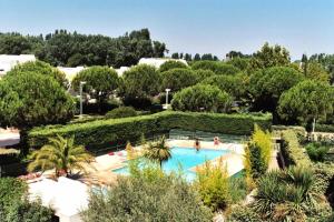 Bazén v ubytovaní Villegiales Tee1 - Appartement climatisé dans résidence avec piscine MAE-1104 alebo v jeho blízkosti + 15 fotografií