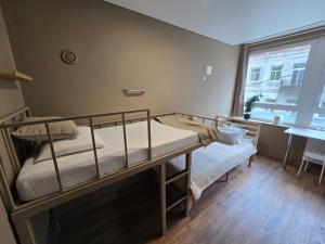 Postel nebo postele na pokoji v ubytování Hostel K3a
