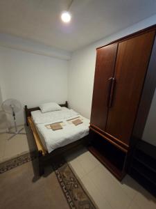Ein Bett oder Betten in einem Zimmer der Unterkunft Sobe Sarajevo